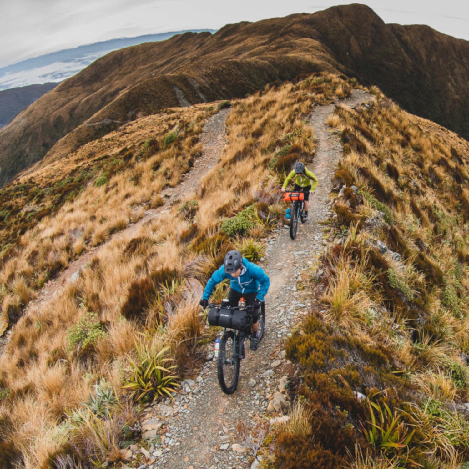 Two riders on Kona Unit X's traversing the Paparoa Track Escarpment