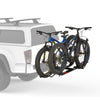 Yakima Holdup EVO hitch mounted vehicle bicycle rack with a 2 bike capacity  shown on the back of a ute